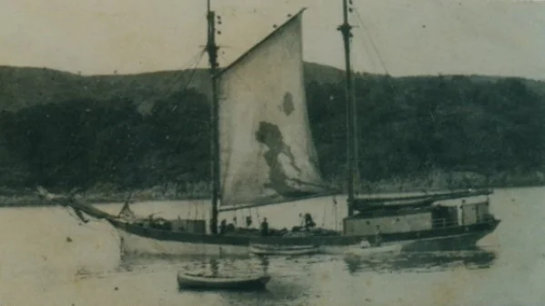 Solway Lass as a cargo vessel in the rain